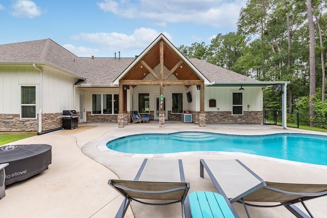 27647 N Salado Ct, Splendora, TX 77372 - view of swimming pool featuring a patio area, a grill, and ceiling fan