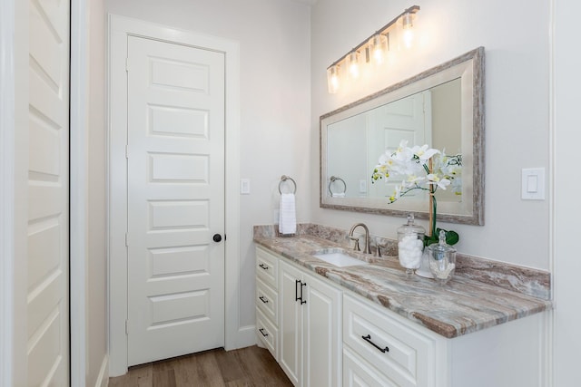 27647 N Salado Ct, Splendora, TX 77372 - bathroom featuring vanity and wood finished floors