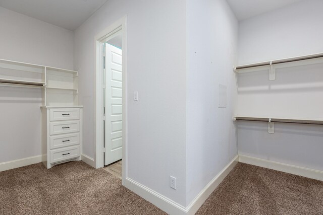 27647 N Salado Ct, Splendora, TX 77372 - spacious closet with light colored carpet