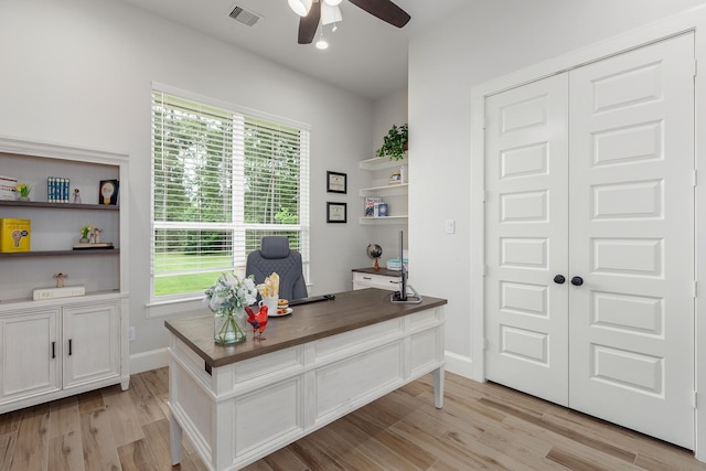 27647 N Salado Ct, Splendora, TX 77372 - office area featuring a ceiling fan and light wood-type flooring