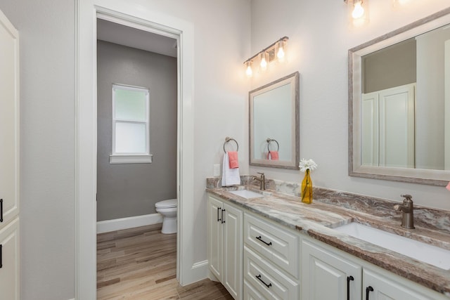 27647 N Salado Ct, Splendora, TX 77372 - full bath featuring double vanity and wood finished floors