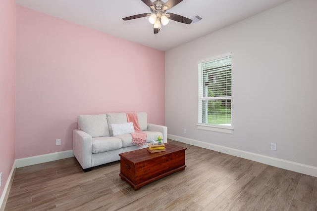 27647 N Salado Ct, Splendora, TX 77372 - living room featuring light wood-style floors and ceiling fan