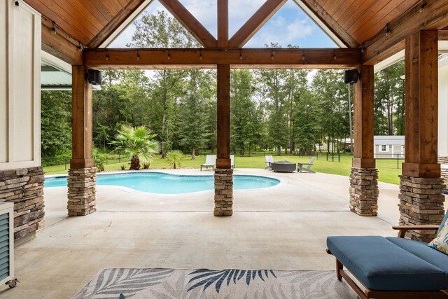 27647 N Salado Ct, Splendora, TX 77372 - swimming pool with a gazebo, a yard, a patio, and view of scattered trees