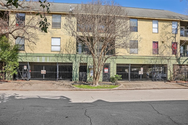 101 Stratford St Unit 103, Houston, TX 77006 - view of property featuring a fenced front yard