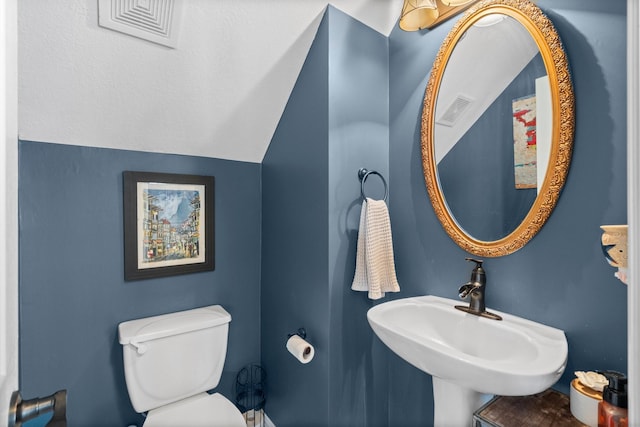 5814 Ashley Spring Ct, Katy, TX 77494 - half bathroom with toilet and lofted ceiling