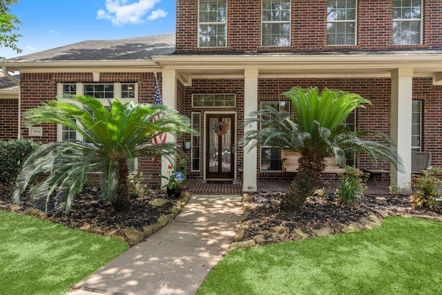 5814 Ashley Spring Ct, Katy, TX 77494 - property entrance with brick siding and covered porch