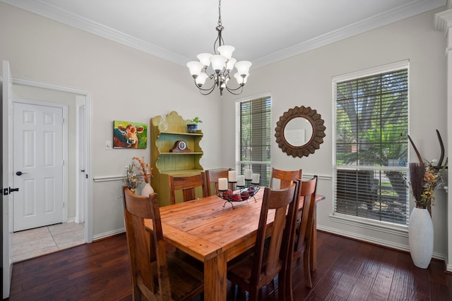 5814 Ashley Spring Ct, Katy, TX 77494 - dining space featuring a chandelier, crown molding, and hardwood / wood-style flooring