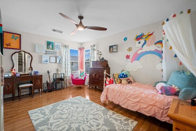 5814 Ashley Spring Ct, Katy, TX 77494 - bedroom with wood finished floors and a ceiling fan
