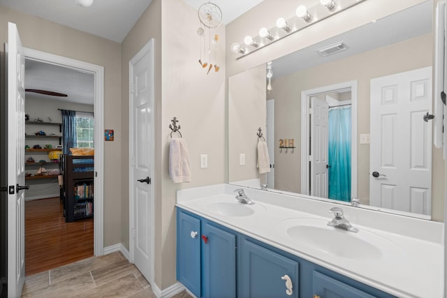 5814 Ashley Spring Ct, Katy, TX 77494 - full bath featuring double vanity and wood finished floors