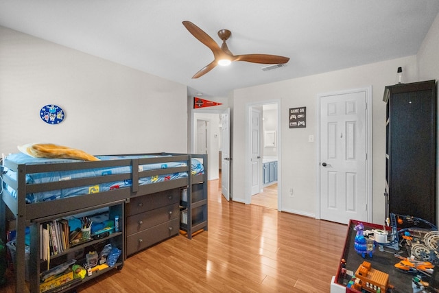 5814 Ashley Spring Ct, Katy, TX 77494 - bedroom with wood finished floors, connected bathroom, and a ceiling fan