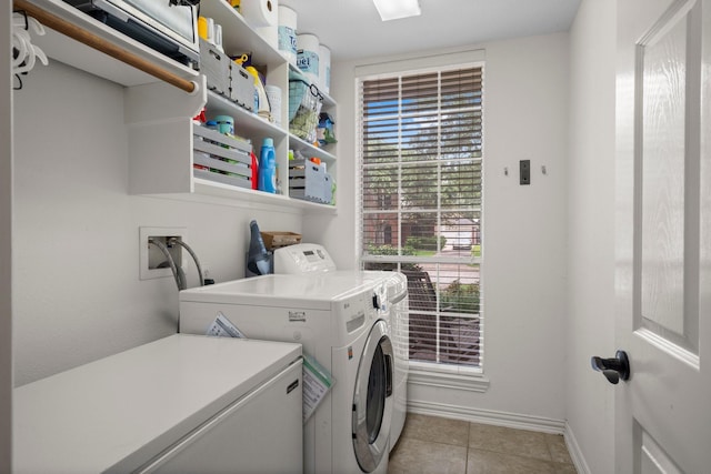 5814 Ashley Spring Ct, Katy, TX 77494 - washroom featuring washer and dryer and light tile patterned flooring