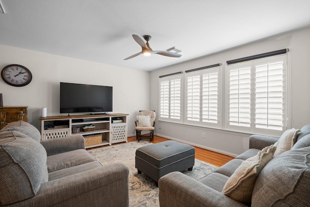 5814 Ashley Spring Ct, Katy, TX 77494 - living room with wood finished floors and a ceiling fan