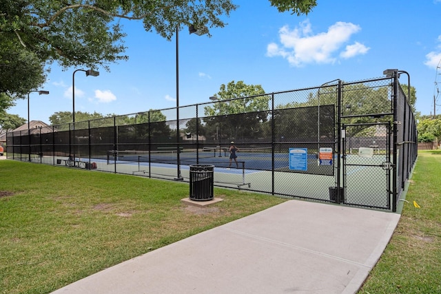 5814 Ashley Spring Ct, Katy, TX 77494 - view of tennis court featuring a gate