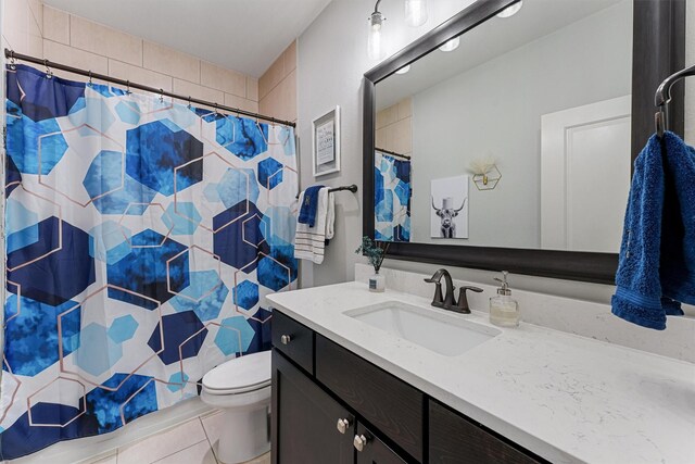 2603 Open Prairie Ln, Katy, TX 77493 - full bath featuring vanity, tile patterned flooring, and a shower with shower curtain