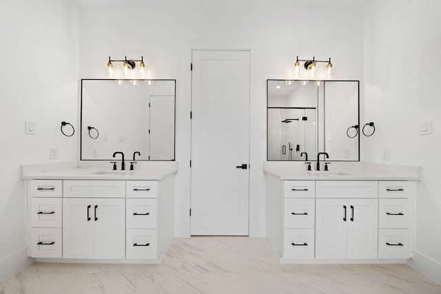 822 E 25th St, Houston, TX 77009 - bathroom featuring marble finish floors, a stall shower, and two vanities