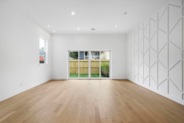 822 E 25th St, Houston, TX 77009 - unfurnished room featuring healthy amount of natural light, light wood-style floors, and recessed lighting