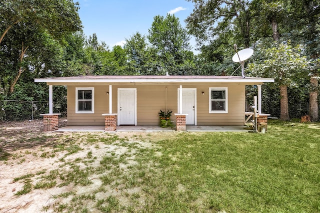 125 James Blvd, Livingston, TX 77351 - view of front of home featuring covered porch