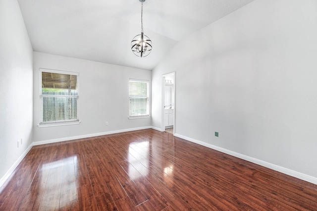 9911 Pierre Ct, Houston, TX 77089 - unfurnished room with a chandelier, vaulted ceiling, and wood finished floors
