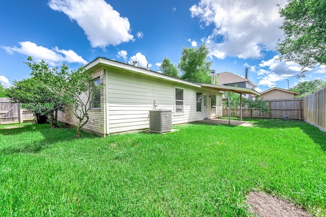 9911 Pierre Ct, Houston, TX 77089 - rear view of property with a fenced backyard and a patio