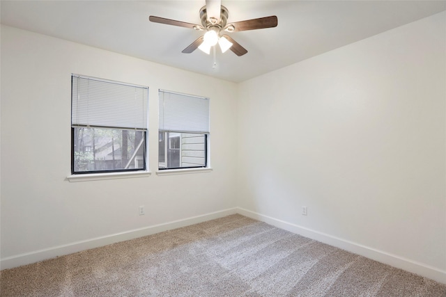 28 Sawmill Grove Ln, The Woodlands, TX 77380 - carpeted empty room with baseboards and a ceiling fan