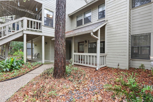 28 Sawmill Grove Ln, The Woodlands, TX 77380 - view of property exterior featuring covered porch