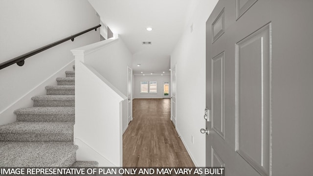 5434 Magnolia Heath Ln, Spring, TX 77373 - corridor featuring wood finished floors, recessed lighting, and stairway