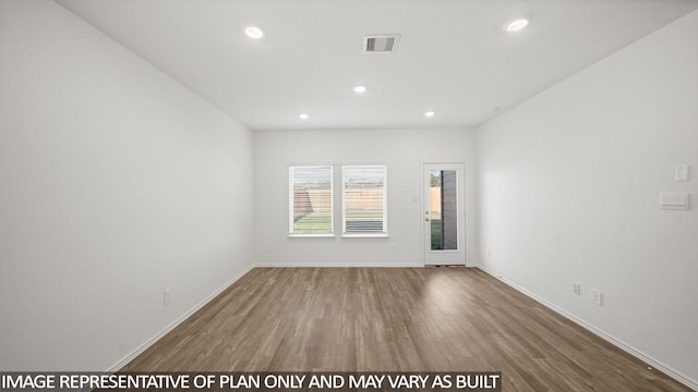 5434 Magnolia Heath Ln, Spring, TX 77373 - unfurnished room featuring recessed lighting and wood finished floors