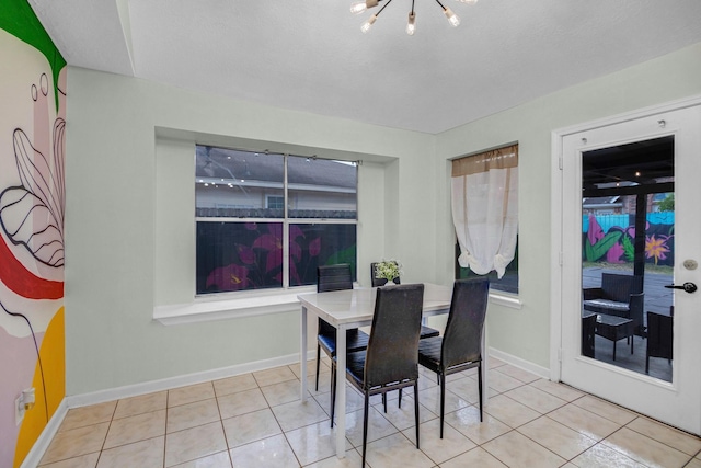 8222 Viny Ridge Dr, Houston, TX 77083 - dining room featuring a chandelier and tile patterned flooring