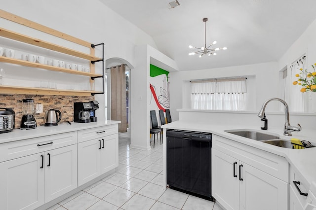 8222 Viny Ridge Dr, Houston, TX 77083 - kitchen with black dishwasher, lofted ceiling, decorative backsplash, light tile patterned flooring, and light countertops
