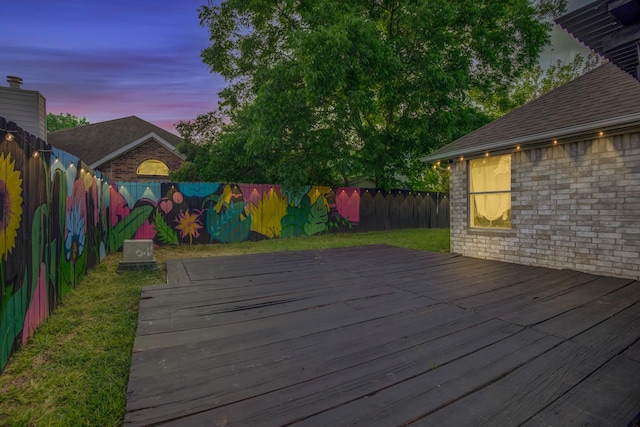 8222 Viny Ridge Dr, Houston, TX 77083 - deck at dusk featuring a fenced backyard