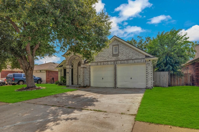 8222 Viny Ridge Dr, Houston, TX 77083 - traditional-style home featuring concrete driveway, an attached garage, and brick siding