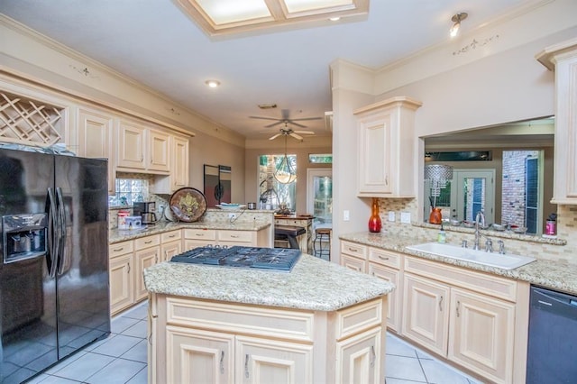 6242 Agassi Ace Ct, Spring, TX 77379 - kitchen featuring black appliances, light tile patterned floors, tasteful backsplash, a kitchen island, and ceiling fan
