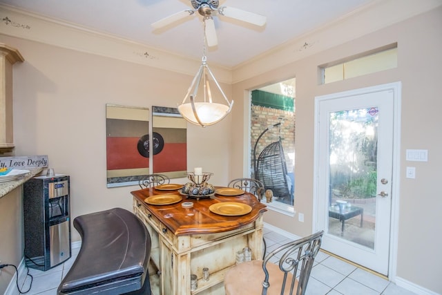6242 Agassi Ace Ct, Spring, TX 77379 - dining area with light tile patterned floors, crown molding, and ceiling fan