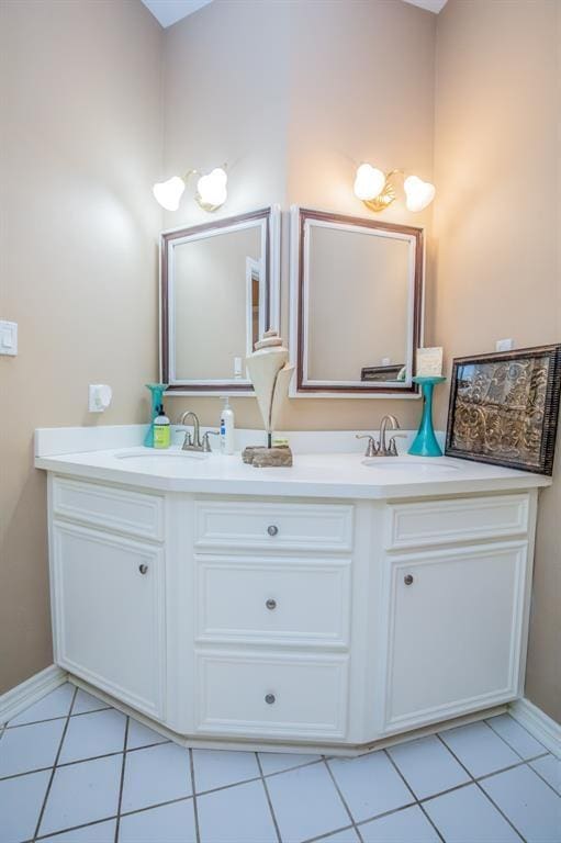 6242 Agassi Ace Ct, Spring, TX 77379 - bathroom featuring double vanity and tile patterned floors