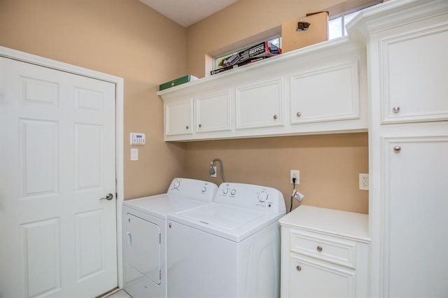 6242 Agassi Ace Ct, Spring, TX 77379 - laundry area featuring cabinet space and washer and dryer