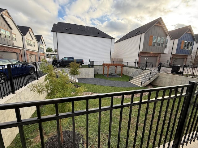 8426 Vogue Ln, Houston, TX 77055 - view of yard with a residential view and an attached garage