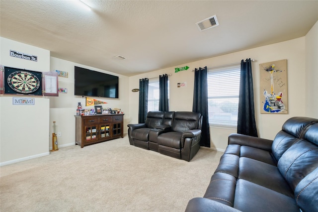 4719 Echo Bay Dr, Baytown, TX 77523 - living room featuring carpet floors and baseboards