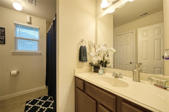 4719 Echo Bay Dr, Baytown, TX 77523 - bathroom with vanity and baseboards