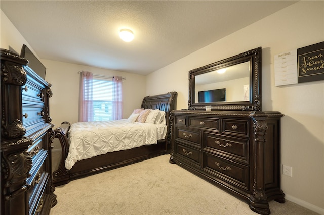 4719 Echo Bay Dr, Baytown, TX 77523 - bedroom featuring light carpet and baseboards