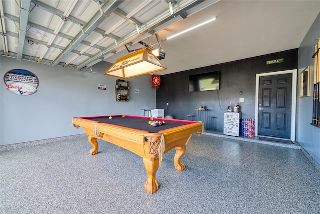 4719 Echo Bay Dr, Baytown, TX 77523 - recreation room with speckle patterned floor, pool table, and a garage