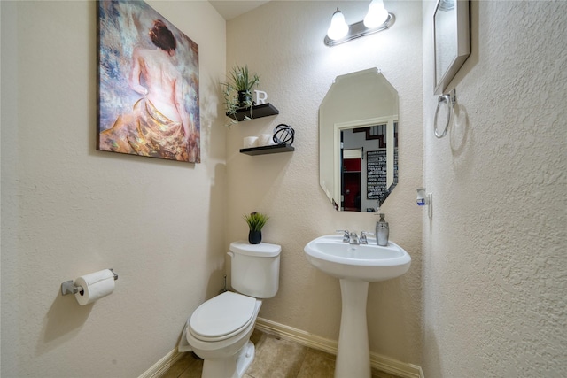 4719 Echo Bay Dr, Baytown, TX 77523 - bathroom featuring toilet and baseboards