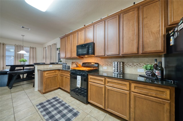 4719 Echo Bay Dr, Baytown, TX 77523 - kitchen with black appliances, a peninsula, backsplash, and brown cabinets