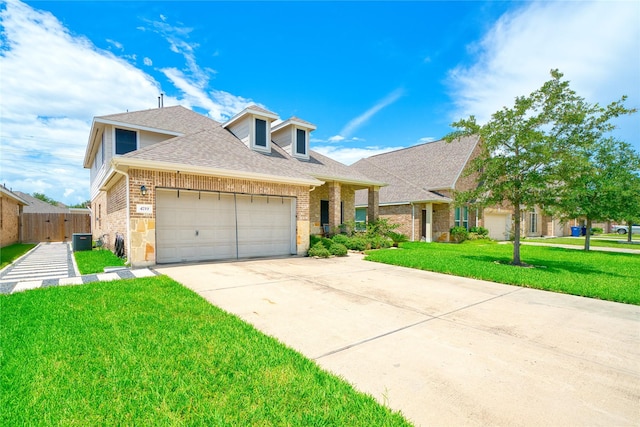 4719 Echo Bay Dr, Baytown, TX 77523 - traditional home featuring brick siding, an attached garage, concrete driveway, and a shingled roof