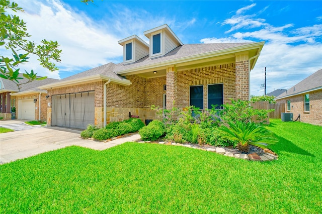 4719 Echo Bay Dr, Baytown, TX 77523 - view of front of home featuring a garage, brick siding, concrete driveway, and a shingled roof