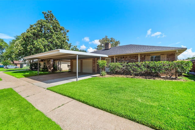1517 Van Buren Dr, Deer Park, TX 77536 - ranch-style home with a front lawn, a chimney, concrete driveway, a garage, and brick siding