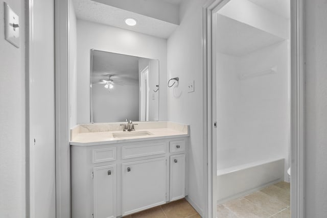 1517 Van Buren Dr, Deer Park, TX 77536 - full bath featuring vanity, tile patterned flooring, ceiling fan, and shower / bathtub combination