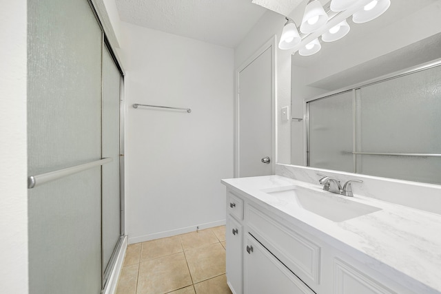 1517 Van Buren Dr, Deer Park, TX 77536 - full bath with a stall shower, vanity, tile patterned floors, and a chandelier