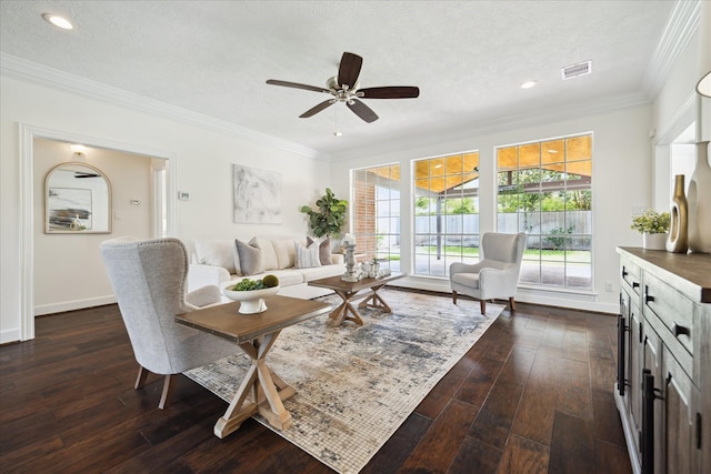13418 Pristine Park Dr, Houston, TX 77041 - living room featuring dark wood finished floors, crown molding, a textured ceiling, ceiling fan, and recessed lighting