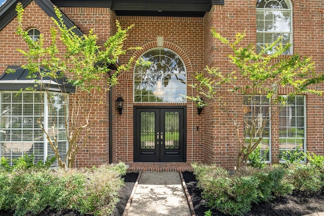 13418 Pristine Park Dr, Houston, TX 77041 - doorway to property with french doors and brick siding