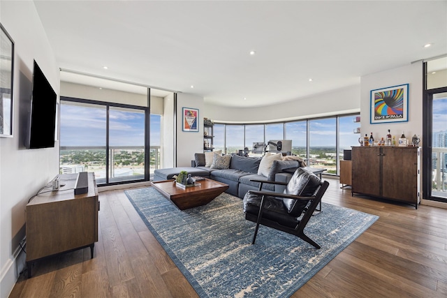 1701 Hermann Dr Unit 23B, Houston, TX 77004 - living room featuring healthy amount of natural light and wood finished floors